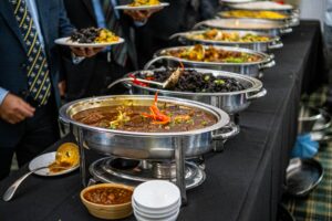 Buffet setup with chafing dishes for rent in Houston, keeping food warm for event guests.