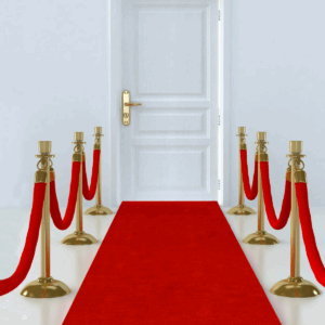Elegant red carpet runner laid out at event entrance, creating a glamorous VIP walkway with stanchions and velvet ropes in Richmond, TX.