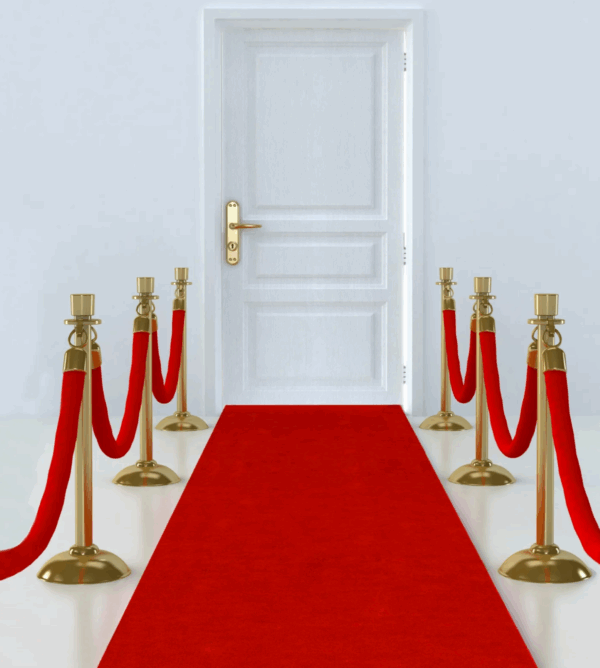 Elegant red carpet runner laid out at event entrance, creating a glamorous VIP walkway with stanchions and velvet ropes in Richmond, TX.