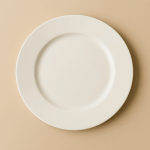 Classic white porcelain plate with a smooth glazed finish—ideal for minimalist table settings, fine dining, restaurant service, and elegant event rentals